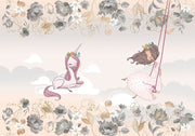 A whimsical nursery wall mural featuring a pink unicorn resting on clouds, a girl swinging with floral details, and soft pastel tones for a dreamy ambiance.