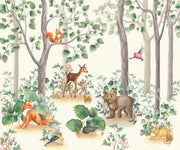 Woodland-themed wall mural featuring a bear cub, deer, squirrel, birds and lush green trees.