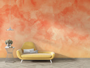 Washed Orange Wallpaper Mural decorating a living room with a yellow sofa.