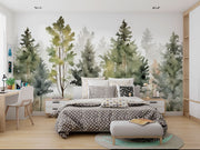 Watercolor forest wall mural with soft green pine trees and a misty effect, creating a peaceful and artistic woodland-inspired space.