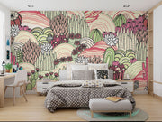 Desert bloom wall mural with hand-drawn cacti, succulents, and rolling hills in pink, green, and cream tones, creating a bold and artistic bedroom backdrop.