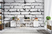 Black and white distressed brick wall mural, industrial faux brick wallpaper for modern bedroom decor.

