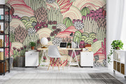 Desert bloom wall mural with hand-drawn cacti, succulents, and rolling hills in pink, green, and cream tones, creating a bold and artistic bedroom backdrop.