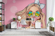 Trendy pop art wall mural featuring a stylish girl with sunglasses and bubble gum on a pink background.