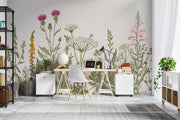 Meadow Bloom Wall Mural featuring delicate wildflowers and lush greenery on a soft-toned background.