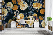 Midnight bloom wall mural featuring large yellow and cream flowers with deep blue foliage on a dark background, creating a dramatic and elegant room atmosphere.