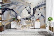 Artistic white horses wall mural featuring flowing manes, brushstroke design, and neutral beige, gold, and charcoal tones decorating a home office.