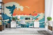 Abstract ocean wave wall mural and wallpaper in vibrant orange and blue tones, styled in a home office.