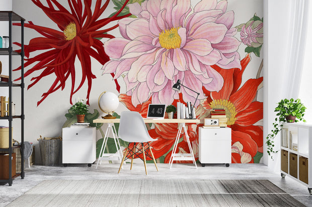 Oversized floral wall mural featuring red, pink, and yellow illustrated blooms with green leaves decorating a modern home office.