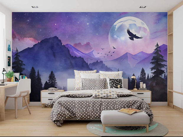 Mystical Moonlit Mountain Wall Mural – Celestial Landscape Wallpaper with a Glowing Full Moon, Birds in Flight, and Twilight Mountain Peaks in Dreamy Purple and Blue Tones.