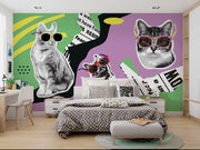 Retro pop art wall mural featuring black-and-white cats wearing colorful sunglasses, with a vibrant mix of geometric patterns, newspaper clippings, and bold colors.