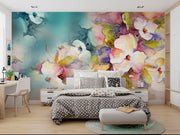 Watercolor blossom wall mural featuring hand-painted flowers in soft pastel and vibrant hues, creating a dreamy and elegant home décor statement.