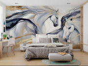 Artistic white horses wall mural featuring flowing manes, brushstroke design, and neutral beige, gold, and charcoal tones behind a bed.