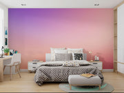 Calming ombre wall mural transitioning from blush pink to twilight purple, ideal for kids' rooms and nurseries.