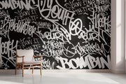 Black and white urban graffiti wall mural with bold typography, perfect for modern home or office decor.