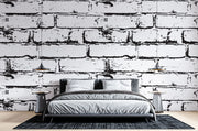 Black and white distressed brick wall mural, industrial faux brick wallpaper for modern bedroom decor.