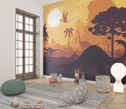 Kids’ dinosaur wall mural featuring silhouettes of Brachiosaurus, Pterosaurs, and prehistoric trees against an orange sunset, ideal for a playful bedroom or playroom.