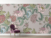 Garden bloom wall mural with pastel pink, green, and blue peonies and leaves, styled in a living room.