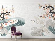 Crane Symphony Wall Mural – Elegant gold-accented cranes flying over ocean waves with cherry blossoms in a Japanese-inspired design.