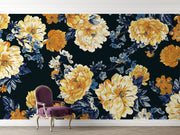 Midnight bloom wall mural featuring large yellow and cream flowers with deep blue foliage on a dark background, creating a dramatic and elegant room atmosphere.