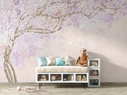 Soft pink and lavender floral wall mural with delicate blossoms on intertwining branches, creating a serene and elegant ambiance.