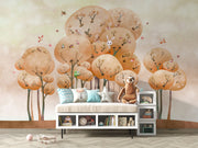 Woodland adventure wall mural with illustrated trees, animals and playful nature elements in a cozy children's room setting.