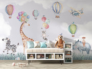 Safari-themed wall mural with watercolor animals, hot air balloons, and a pastel sky—ideal for nursery and kids' room décor.