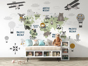 Scandinavian style children's world map wall mural with cute animals and airplanes, styled in a kid's playroom.