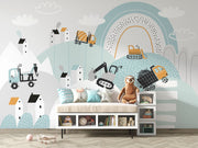 Construction site wall mural with trucks, diggers, and cranes in a pastel blue and orange theme, ideal for kids’ room decor.