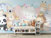Watercolor baby animal wall mural with an elephant, lion, panda, fox, koala, and other cute creatures in pastel tones.