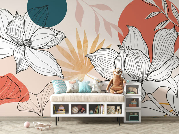 Playroom setup with plush toys and a floral line art wall mural in soft earthy tones and modern shapes.