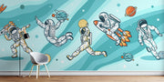 Playful astronaut-themed wall mural featuring astronauts, rockets, planets, and comets, ideal for kids’ bedroom or playroom decoration.