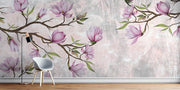 Pink Magnolia Wall Mural with blooming branches on a textured background .
