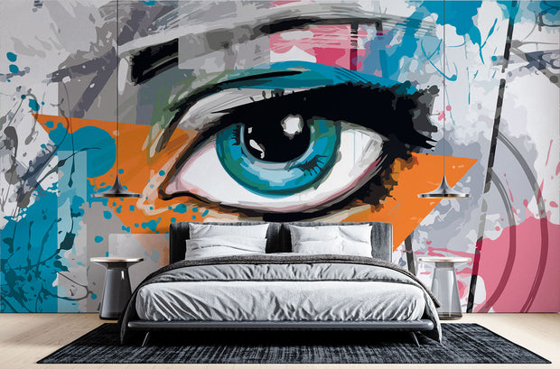 Abstract eye graffiti wall mural with bold blue eye, orange and teal splashes, and street art-inspired brushstrokes.