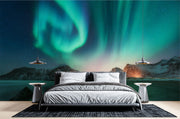 Northern lights wall mural featuring green and blue auroras over snowy mountains and a frozen lake, creating a mesmerizing and tranquil atmosphere.