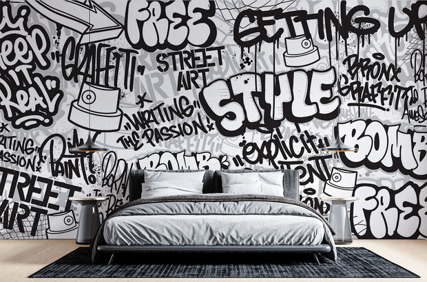 Graffiti wall mural with black-and-white street art typography and spray paint elements, ideal for urban-inspired bedrooms or creative spaces.