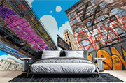 Urban cityscape wall mural with graffiti, comic-style illustration of skyscrapers and underpass, modern street art wallpaper for bedroom or living room decor.
