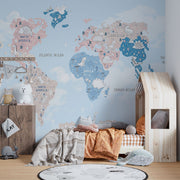 Pastel dinosaur world map wall mural featuring adorable prehistoric creatures, soft blue and pink tones and a whimsical design; perfect for kid's rooms and nurseries.