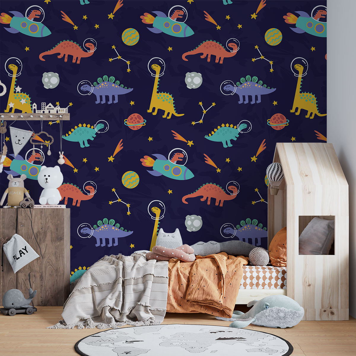 Space Dinosaurs Wall Mural featuring colorful astronaut dinosaurs, planets and stars; decorating kid's bedroom.