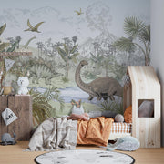 Prehistoric dinosaur wall mural featuring a jungle scene with a Brachiosaurus, Stegosaurus, pterodactyls, and a volcano in a children’s room.
