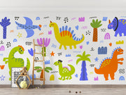 A colorful dinosaur wall mural with playful hand-drawn dinos, palm trees, and doodles, perfect for kids' rooms and nurseries.
