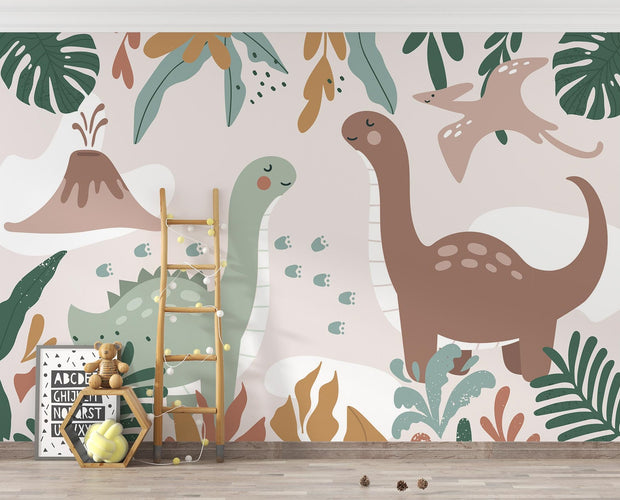 Kids’ wall mural with cartoon dinosaurs, volcano, pterodactyl, and tropical leaves in soft earth tones; styled in a cozy children’s playroom.