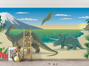 Dinosaur wall mural featuring a scenic beach with a Brachiosaurus, Triceratops, ocean waves, and a soaring Pteranodon at sunset.
