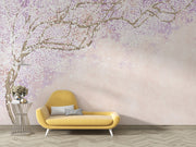 Soft pink and lavender floral wall mural with delicate blossoms on intertwining branches, creating a serene and elegant ambiance.