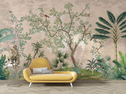 Yellow sofa in front of a wall with tropical plant mural