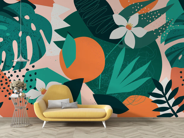Yellow sofa in front of a colorful wall with abstract leaves and flowers