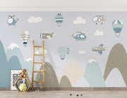 Aviation-themed wall mural for kids featuring airplanes, helicopters, hot air balloons, and mountains in soft pastel colors, perfect for a nursery or playroom.