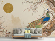 Peacock serenity wall mural with a detailed peacock, cherry blossoms, and golden sun on a beige background in a calm, elegant living room.