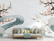 Crane Symphony Wall Mural – Elegant gold-accented cranes flying over ocean waves with cherry blossoms in a Japanese-inspired design.
