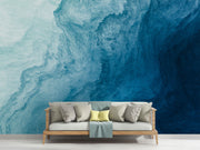 Deep blue abstract wall mural with flowing textures, creating a calming and elegant bedroom atmosphere.